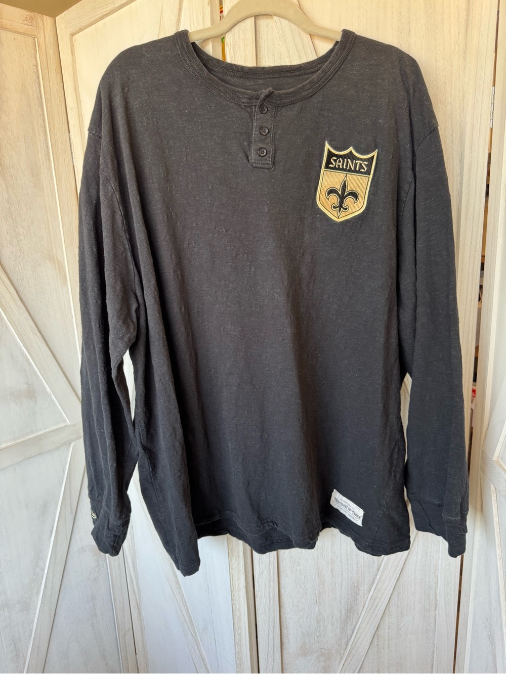 Mitchell & Ness Black Long-Sleeve Henley with Gold Saints patch Crest